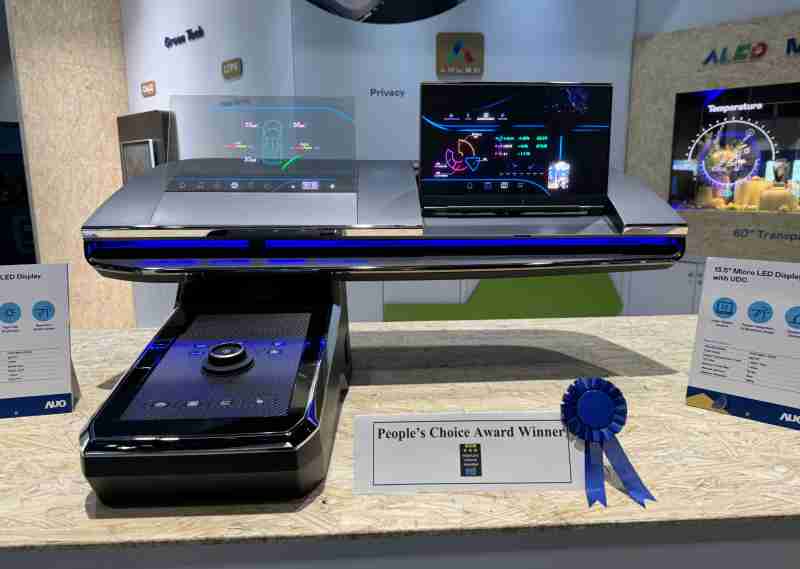 万利车用Micro LED Display HMI解决方案获”最佳车用显示奖”，，以用户为中心开发，，针对前座驾驶与乘客设计兼具娱乐与安全的高画质屏幕，，，，包含车舱前座的Micro LED透明屏幕及全球首款内建镜头的智慧Micro LED显示器